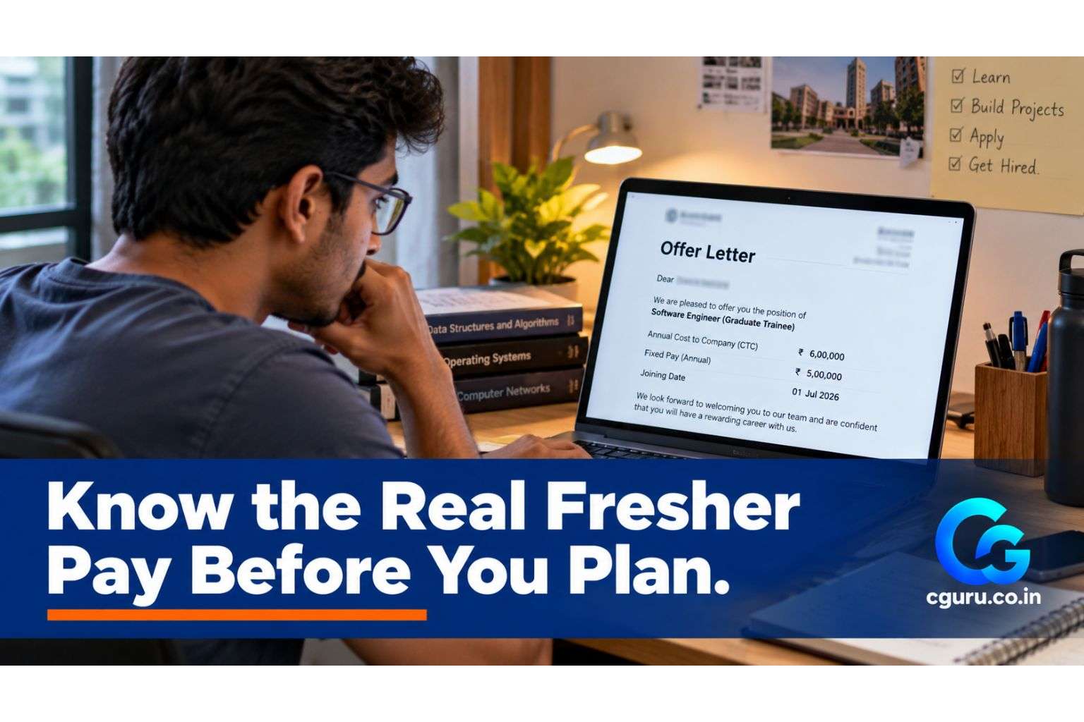 Engineering fresher checking salary details on a laptop.